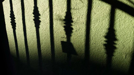 Creaky Wrought Iron Gate & Cowbell Shadow